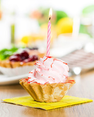 Pink birthday cupcake