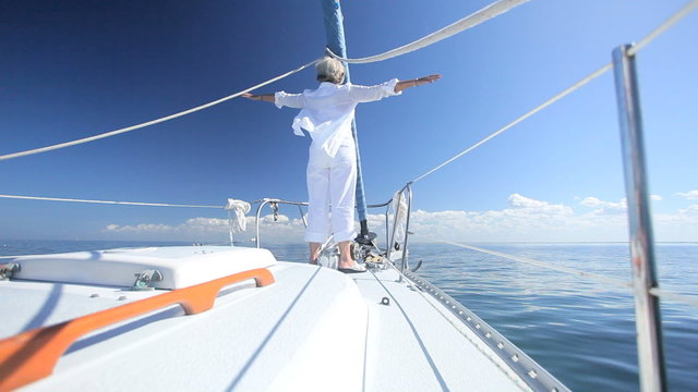 Senior Lady Having Fun on the Water on Luxury Yacht