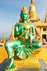 Indra statue with blue sky