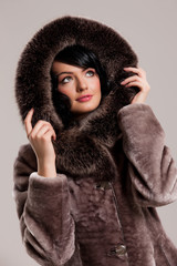 Young Woman In A Fur Coat