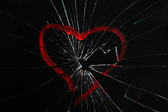 Red heartbreak  broken heart close up of a paper broken heart on black  background with clipping path Stock Photo  Alamy