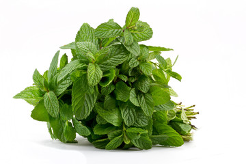 Fresh mint leaves isolated on white.