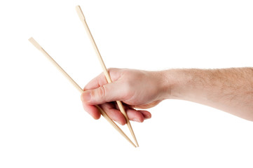Male Hand Holding a Pair of Chopsticks