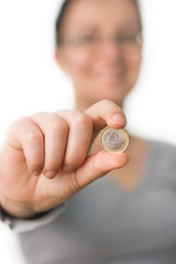 woman holding coin