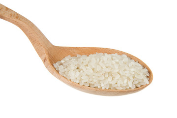 Fototapeta na wymiar rice grain in wooden spoon isolated on white