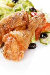 Roasted chicken legs with salad