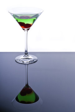 Green Martini Cocktail with Maraschino Cherries