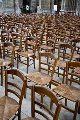 wood chairs in Catholic cathedral