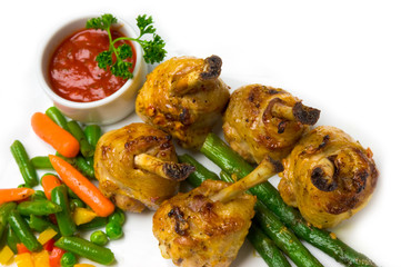 chicken legs with asparagus and ketchup