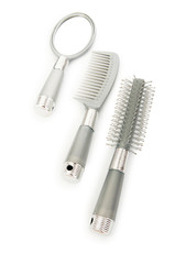 Grey hairbrushes isolated on the white background