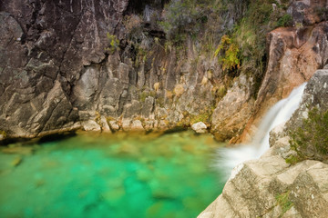 Fototapeta na wymiar Beautiful waterfall at Geres National Park, north of Portugal