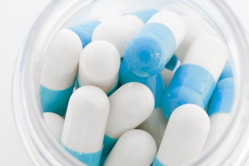 Pot of capsule pills
