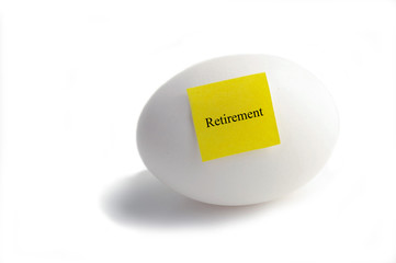 Egg with Retirement text on yellow note paper