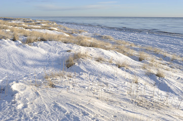 Sand dunes covered with snow