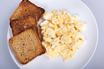 Breakfast - toasts, eggs, bacon