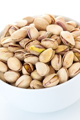 pistachios in a white bowl