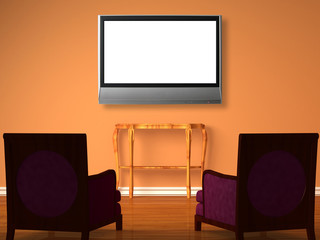 Two chairs with wooden table and lcd TV in orange interior