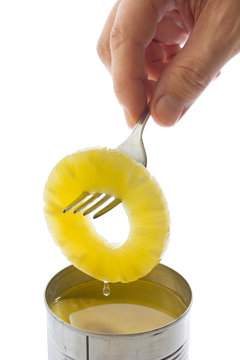 pineapple ring on a fork