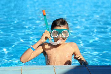 Boy in a swimming pool