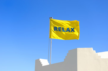 Yellow flag with a word "Relax"