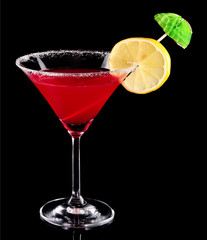 Martini glasses on black background