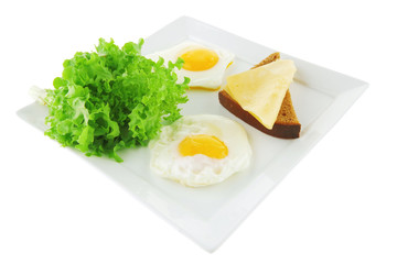 green lettuce and fried eggs