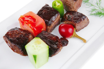 eef meat goulash over white plate isolated on white background