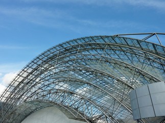 A closeup of a modern building with frames and glass