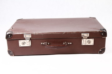 Vintage suitcase on white background