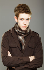 Obraz premium attractive young man wearing elegant shirt and scarf