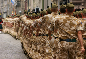 Column of soldiers marching.