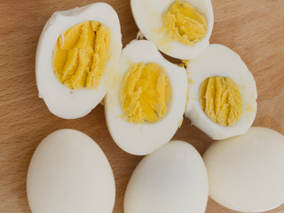 boiled eggs cut  on the wooden board