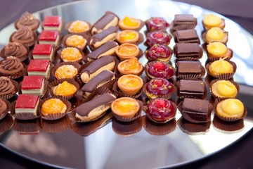 small cakes on tray