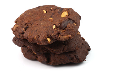 three homemade chocolate cookies with peanuts