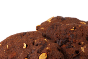 three homemade chocolate cookies with peanuts