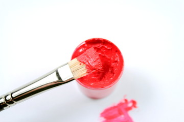 Brush with red paint