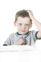 Naklejka premium young boy working at school