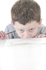 young boy stressed with work