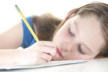 Girl looking tired with homework