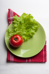 sheet green lettuce and red tomato