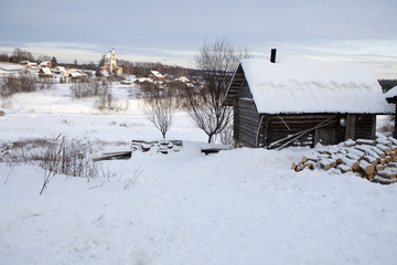 Upper Volga region. Holoholnya village in Russia in winter time.