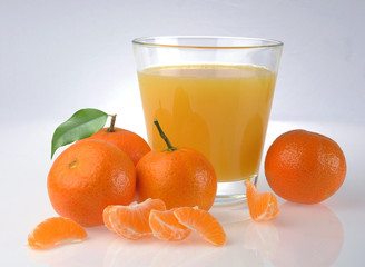 tangerine and juice glass