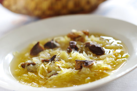 Traditional sauerkraut soup with mushrooms