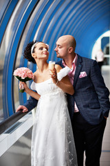 Bride and groom in blue interior