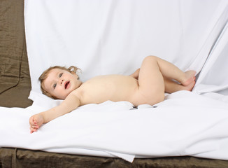 Obraz na płótnie Canvas Smiling baby after bath