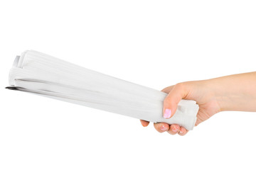 Hand giving newspapers