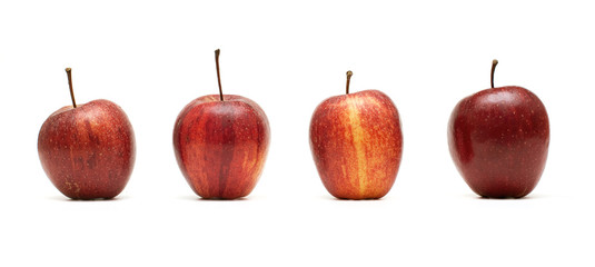four apples on white