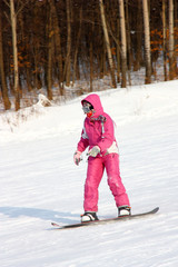 Fototapeta na wymiar attractive young woman skiing
