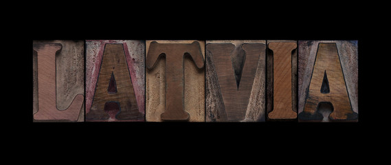 the word Latvia in old letterpress wood type