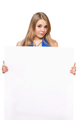 Fototapeta premium Pretty young woman posing with white board